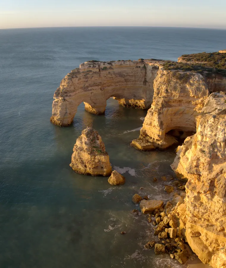 Praia da Marinha from the air, with its arches and sea stacks